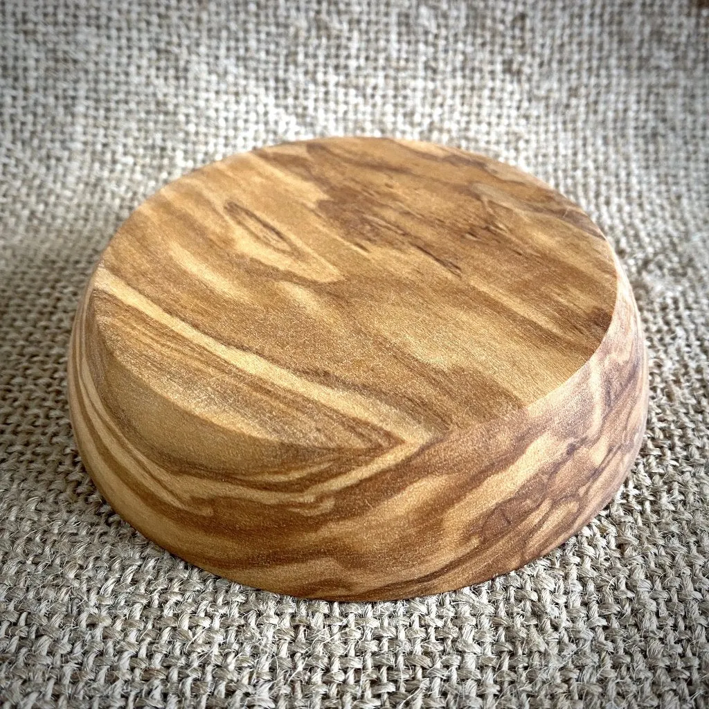 Shungite Sphere on Bed of Microtumbled Crystal in Olive Wood Bowl